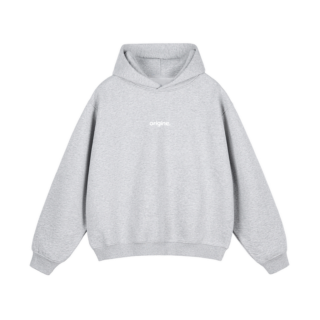 Unisex streetwear hoodie from Origine, minimalist oversized design in soft cotton, perfect for everyday wear. Designed for Dreamers – modern essential with subtle urban aesthetic.